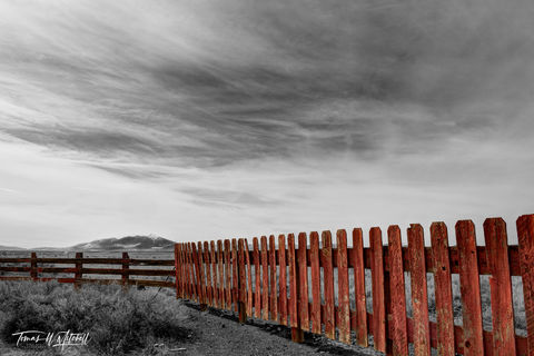 red fence and kachina mountains in Arizona