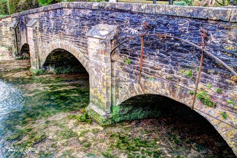 By Brook Bridge, Castle Combe, England