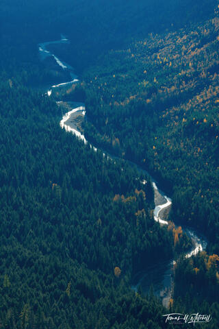 Evening autumn light on Logan Creek in Glacier National Park