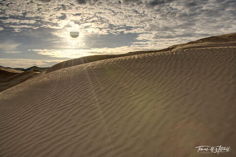 annular solar eclipse over sand dunes at Little Sahara, Utah