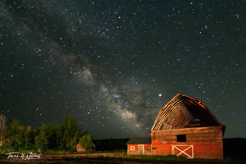 Old red barn with night sky Milky Way Utah