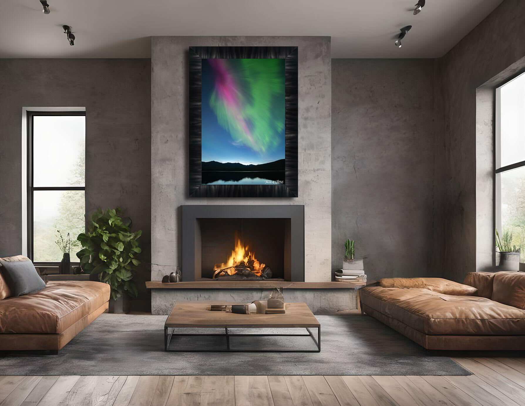 framed photograph of northern lights on home wall.