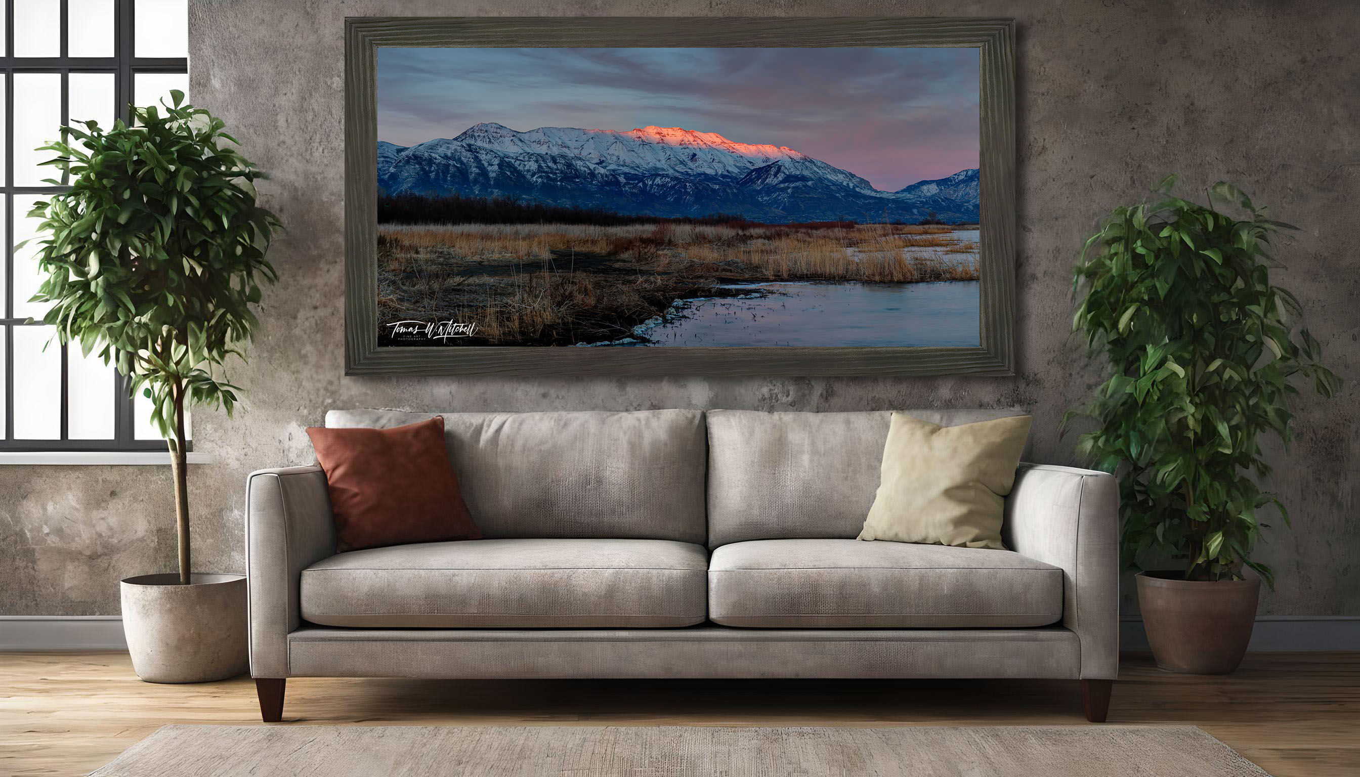 framed photograph of mountain in winter on home wall