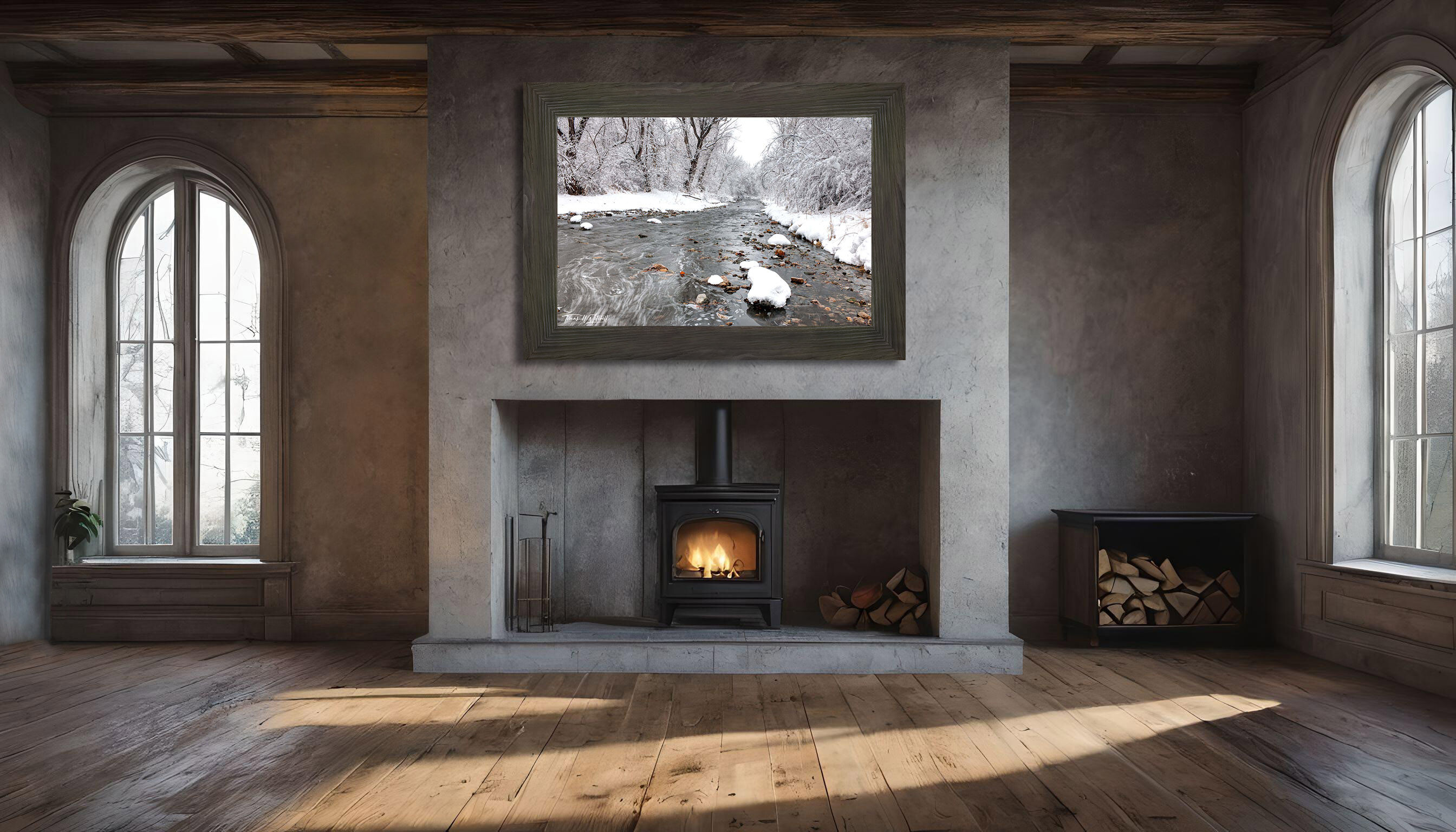 framed photograph of winter scene with river on home wall