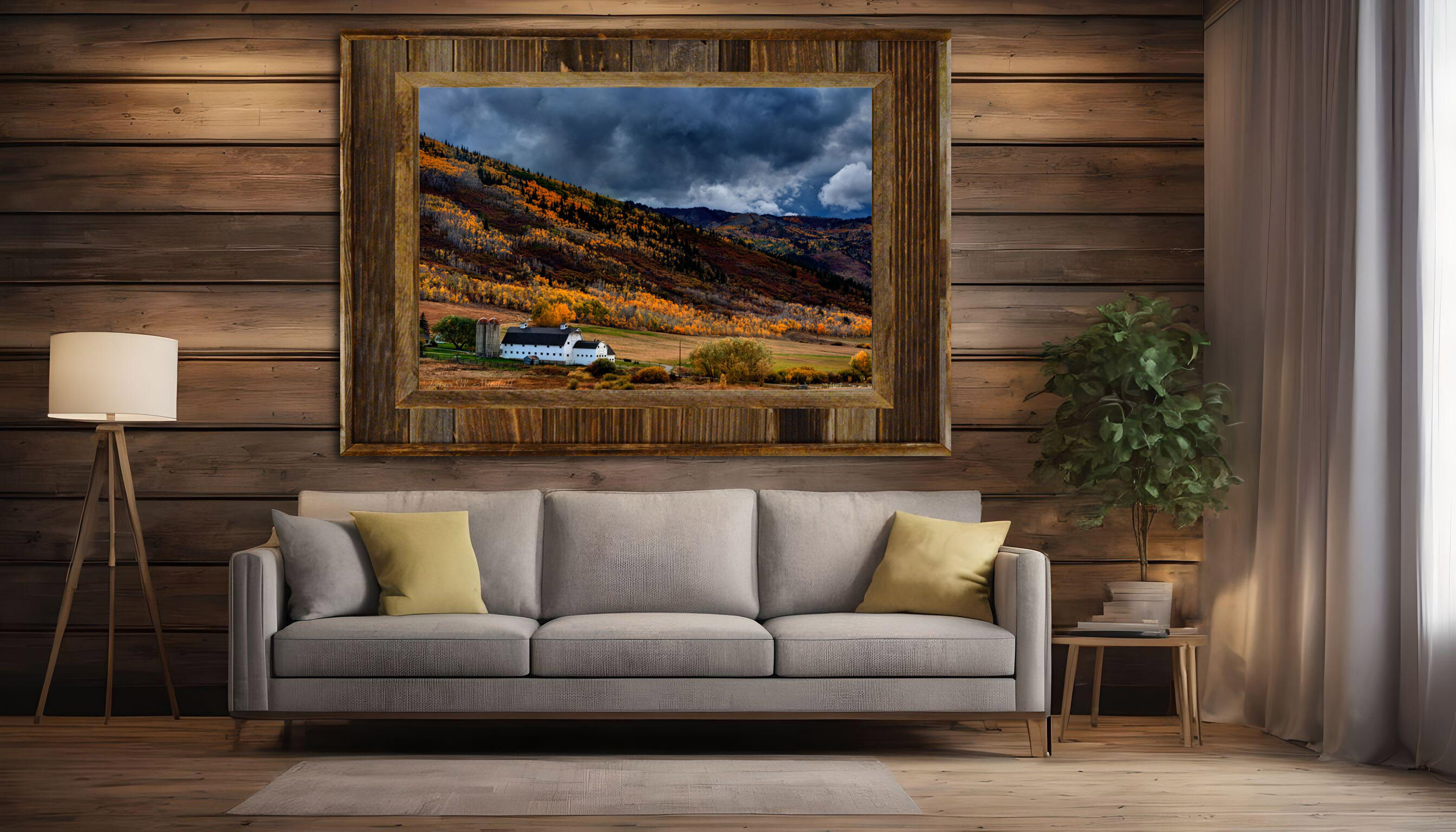 framed photograph of barn in autumn on home wall