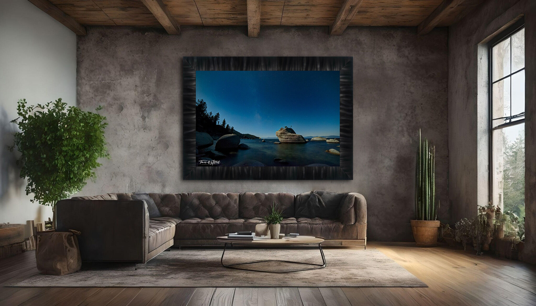 framed photograph of Lake Tahoe at night on home wall