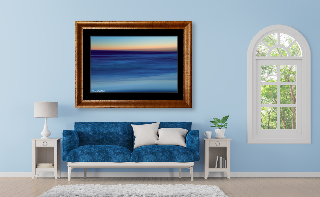 framed print of abstract sunset on home wall