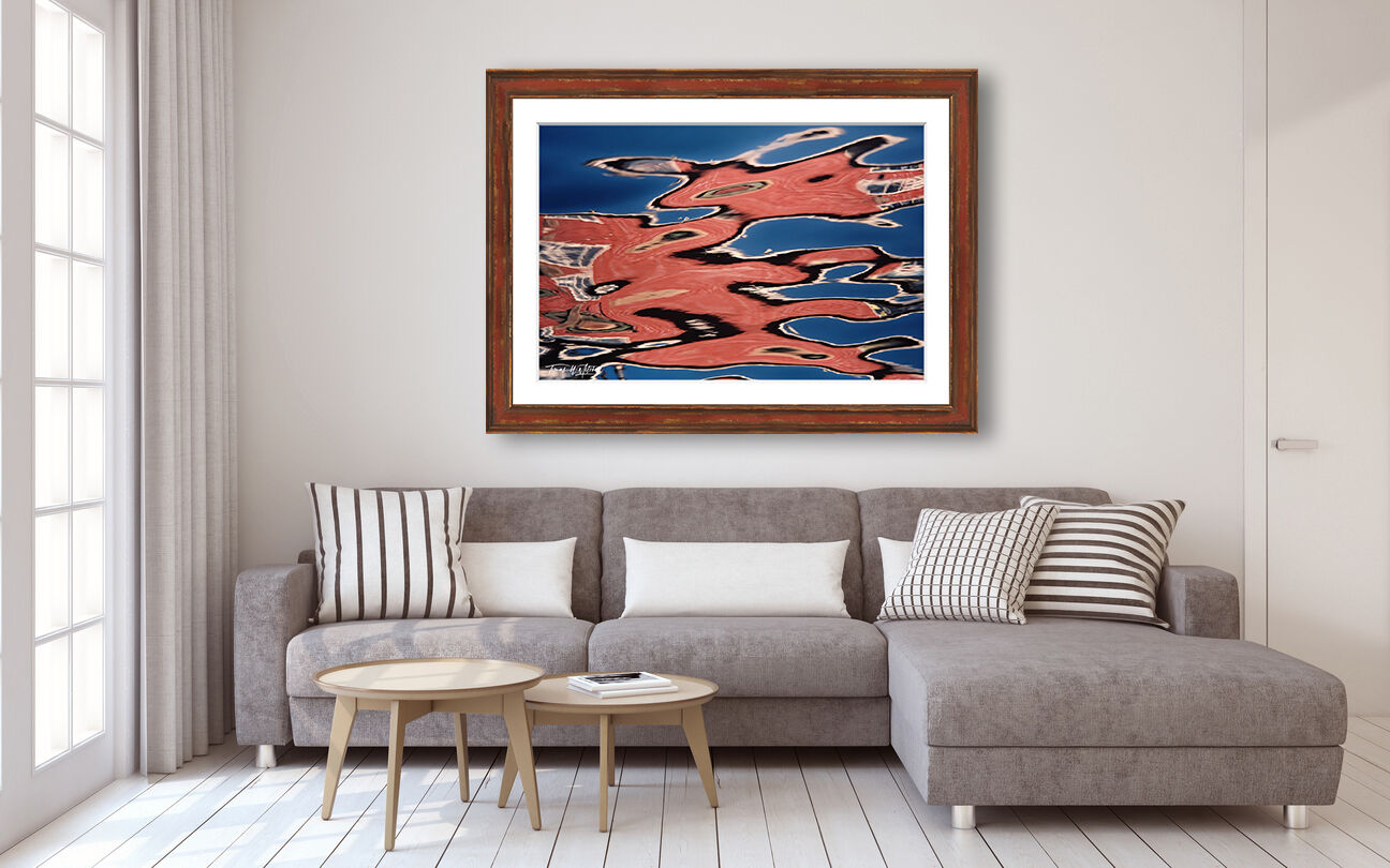 framed photograph of abstract reflection in water on home wall