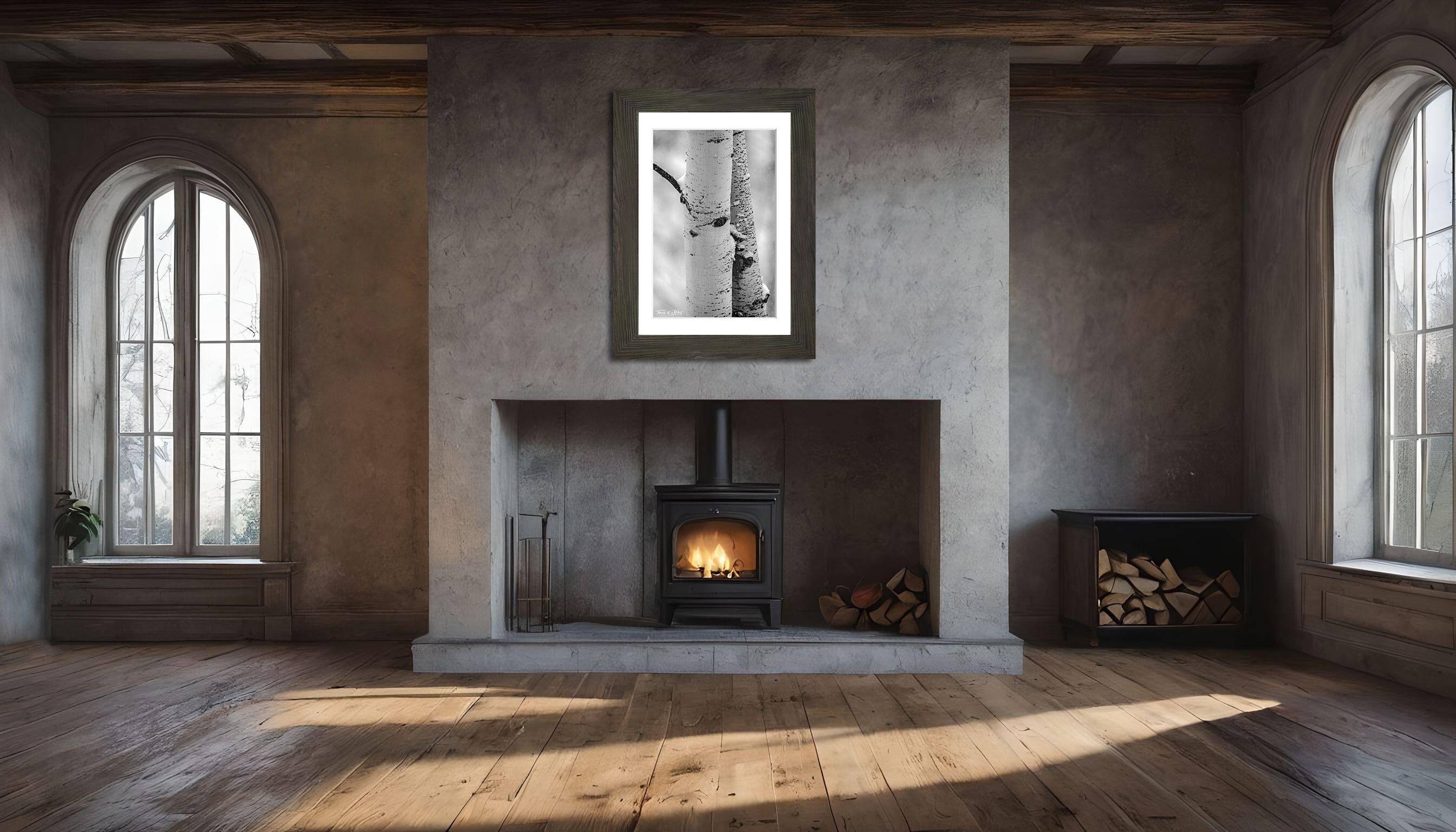 framed photograph of quaking aspen trees in winter snow on home wall